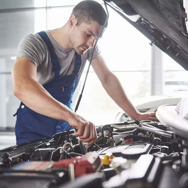 auto mechanic working garage repair service scaled e1719492512894